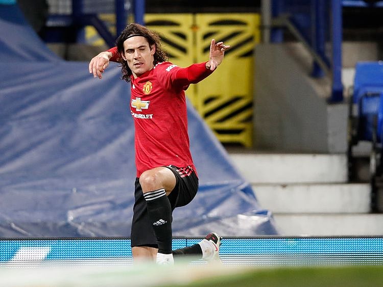 Manchester United's Edinson Cavani celebrates scoring against Everton