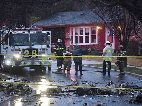 Firefighters found one man dead inside a small plane that crashed into a carport in Prince George's County, Maryland, on Sunday, Dec. 29, 2019.