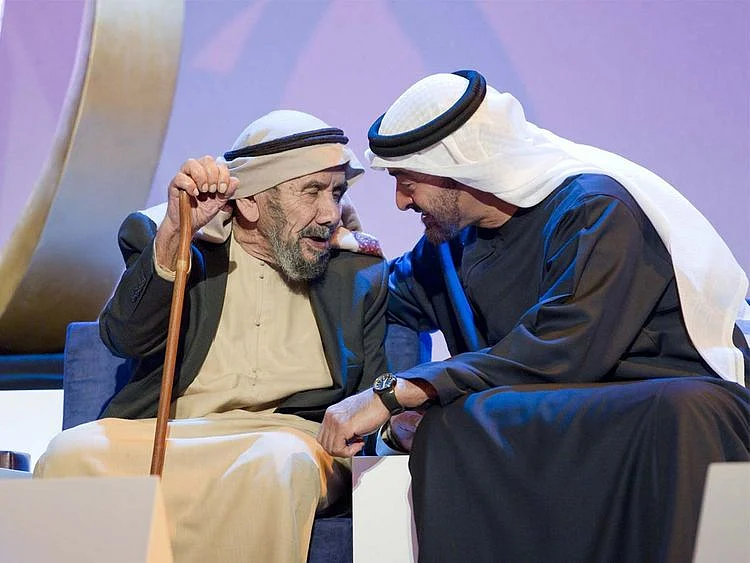 Sheikh Mohamed bin Zayed with Emirati veteran Aqeeda Ali Al Muhairi 