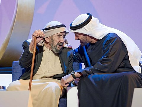 Sheikh Mohamed bin Zayed with Emirati veteran Aqeeda Ali Al Muhairi 