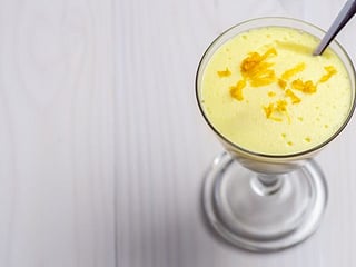 Honey mousse with raspberry and mango sauce