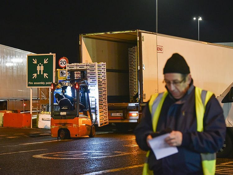 A man unloads a lorry in New Covent Garden Market