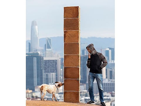 A gingerbread monolith stands on Christmas Day, Dec. 25, 2020, on a bluff in Corona Heights Park overlooking San Francisco.