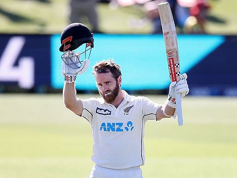 New Zealand's captain Kane Williamson celebrates his century during day two of the second international cricket Test match vs Pakistan at Hagley Oval in Christchurch on January 4, 2021. 
