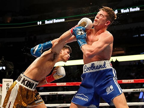 Ryan Garcia lands a right against Luke Campbell during the WBC Interim Lightweight Title fight 
