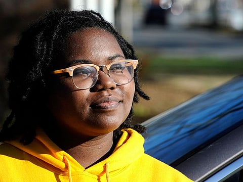 Unique Morgan Dunston pauses in her hometown of Albertville. Transformed by leaving the virtually all-white town where she grew up, Dunston has been leading the demonstrations since August 2020. 