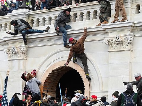 Supporters of US President Donald Trump breach the walls of United States Capitol, meeting place of the American Congress and the seat of the legislative branch of the federal government, Washington DC