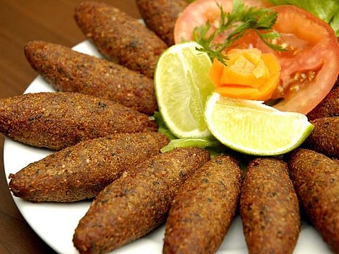 Kebbeh Samak or baked fish with burghul