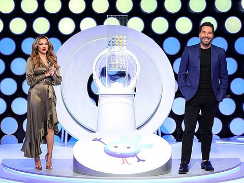 From left: Hosts Aishwarya Ajit and Wissam Braidy at the Mahzooz weekly draw.