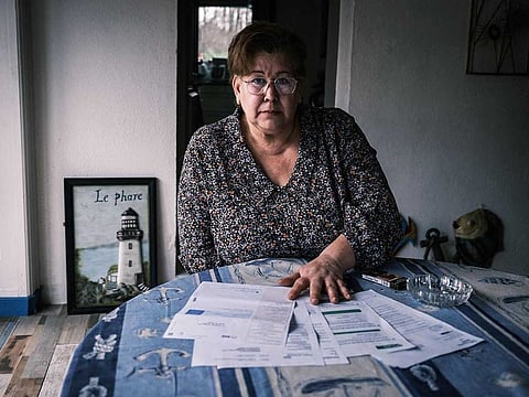 Jeanne Pouchain who, since November 2017, has been declared dead by the justice system after being convicted by the Prud'hommes, sits at her dining table on January 8, 2021, in Saint-Joseph.
