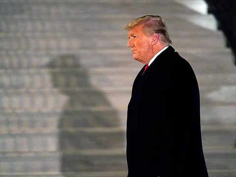 President Donald Trump arrives on the South Lawn of the White House, in Washington, after returning from Texas on Tuesday, Jan. 12, 2021. The shadow of an impeachment will likely follow Trump after he leaves the White House on January 20, 2021. 