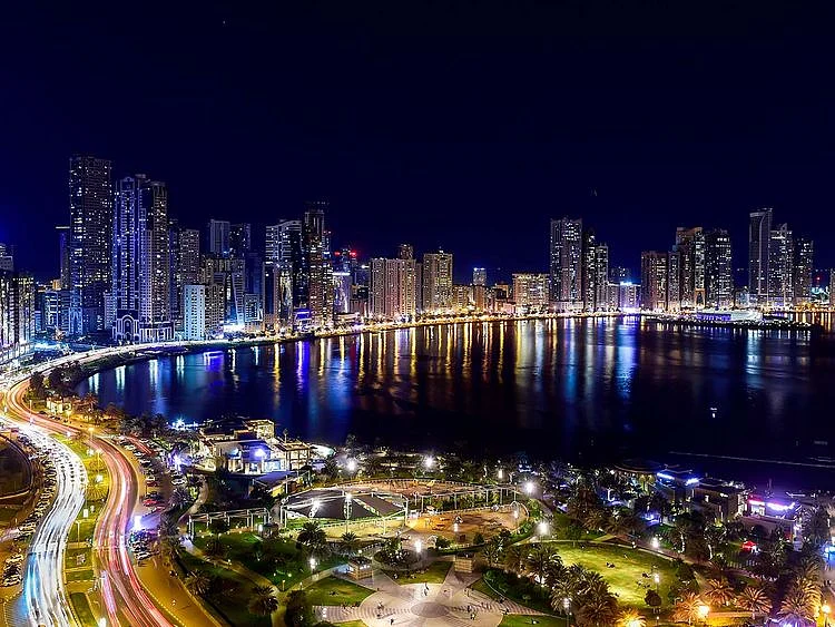 Stock Buhairah Corniche and Sharjah Skyline