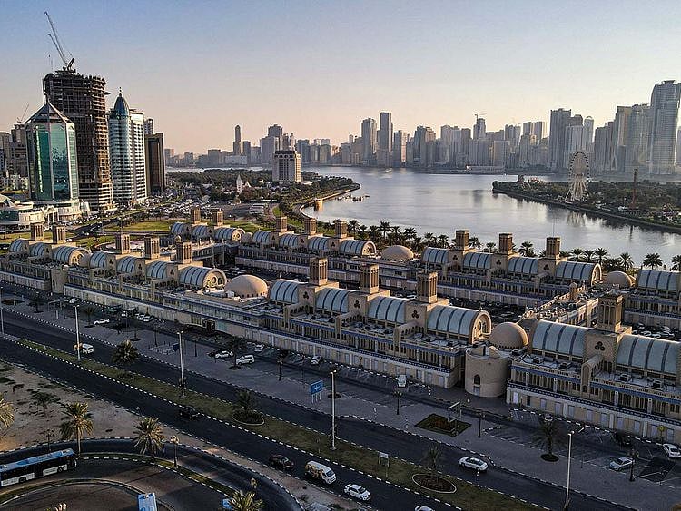 Stock Buhairah Corniche and Sharjah Skyline
