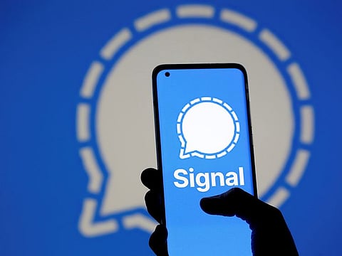 The Signal messaging app logo is seen on a smartphone.