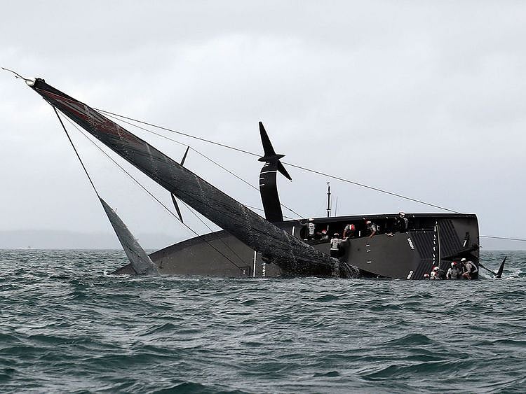 New York Yacht Club American Magic capsizes during Round Robin two, Race three against Luna Rossa during the Prada Cup 2021, the challengers series of the 36th America's Cup in Auckland on January 17