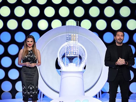 From left: Hosts Aishwarya Ajit and Wissam Braidy at the Mahzooz weekly draw.