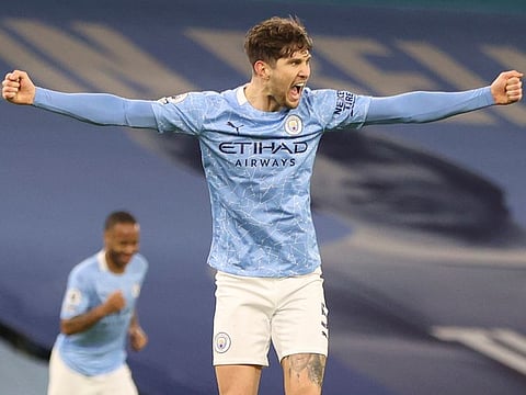 Manchester City's John Stones celebrates after scoring.