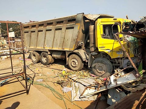 Mangled remains of the truck, which ran over migrant labourers from Rajasthan sleeping by the roadside, shortly after midnight, near Surat, Tuesday morning, Jan. 19, 2021. 