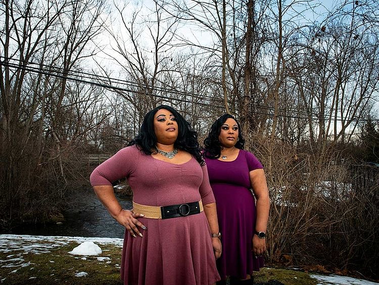 Twins Kimberly, left and Kelly Standard in Rochester, covid