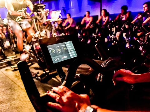 An indoor cycling class for Peloton in New York, Sept. 8, 2016. The bike’s tablet has a built-in camera and microphone, allowing users to see and hear one another if they choose. 