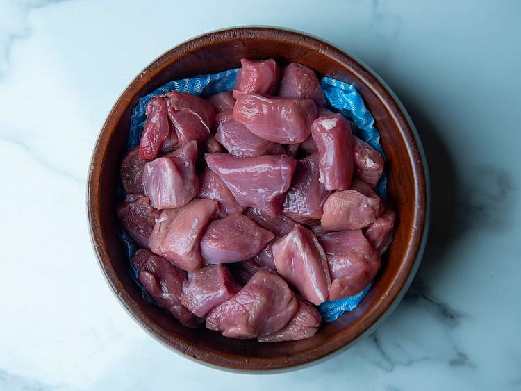 Place boneless lamb meat in a bowl