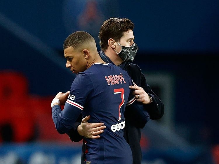 Kylian Mbappe with Paris St-Germain boss Mauricio Pochettino