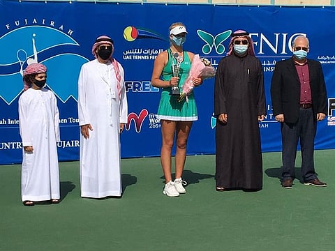 Clara Tauson with the trophy at the presentation for the Fujairah International Women Tournament