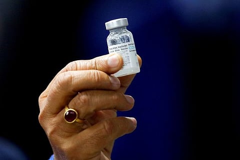 Indian Health Minister Harsh Vardhan holds a dose of Bharat Biotech's COVID-19 vaccine called COVAXIN, during a vaccination campaign at All India Institute of Medical Sciences (AIIMS) hospital in New Delhi, India, January 16, 2021.