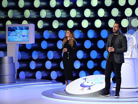 From left: Hosts Aishwarya Ajit and Wissam Braidy at the Mahzooz weekly draw.