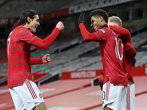 Manchester United celebrate against Liverpool