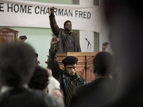 This image released by Warner Bros. Pictures shows LaKeith Stanfield, foreground, and Daniel Kaluuya in a scene from the upcoming film "Judas and the Black Messiah."