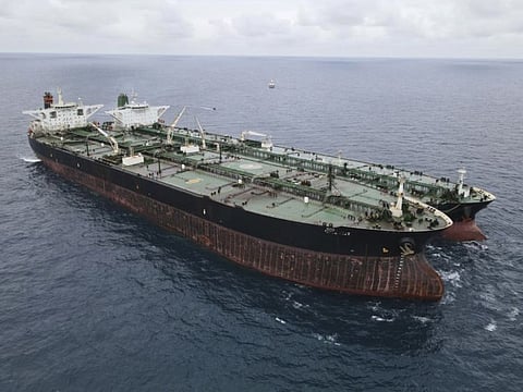 In this photo released by Indonesian Maritime Security Agency (BAKAMLA), Panamanian-flagged MT Frea, left, and Iranian-flagged MT Horse tankers are seen anchored together in Pontianak waters off Borneo island, Indonesia, Sunday, January 24, 2021. Indonesian authorities said that they seized the two vessels suspected of carrying out the illegal transfer of oil in their country's waters. 