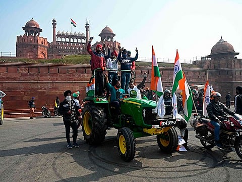 Farmers protest against the central government's recent agricultural reforms in front of Red Fort in New Delhi on January 26, 2021.