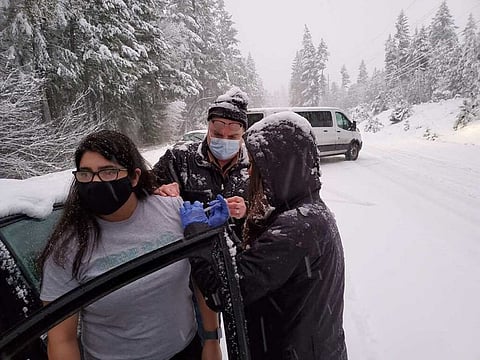 An impromptu roadside vaccination in rural southern Oregon during a snowstorm, when public health workers realised their remaining doses of vaccine would expire while they were stranded. 