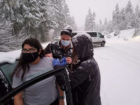 An impromptu roadside vaccination in rural southern Oregon during a snowstorm, when public health workers realised their remaining doses of vaccine would expire while they were stranded. 