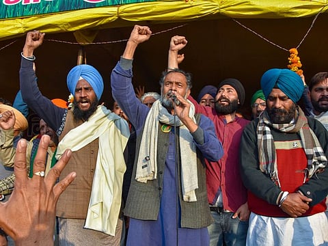 New Delhi: Swaraj India President Yogendra Yadav addresses during the ongoing farmers' agitation against Centre's farm reform laws, at Ghazipur in New Delhi, Friday.
