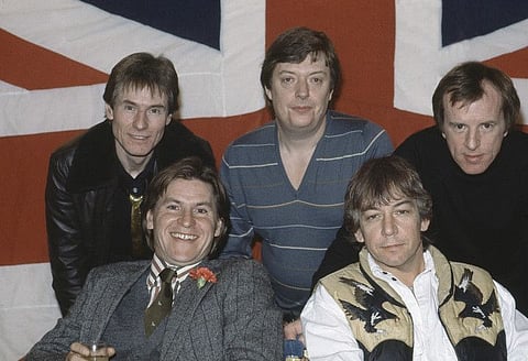 British pop group 'The Animals' pose for photographers after they had announced plans for a world tour, in London in 1983. From left to right back; Hilton Valentine, Chas Chandler, John Steel. Front row; Alan Price, left, and Eric Burdon. (AP Photo/Str/Glanville)