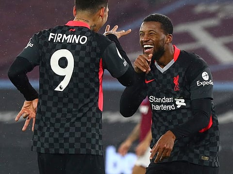 Roberto Firmino and Georginio Wijnaldum.