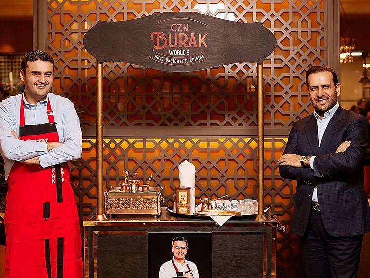 Rizgar Sak (right), Chairman of Dives Holding, which operates CZNBurak, with chef Burak Ozdemir 