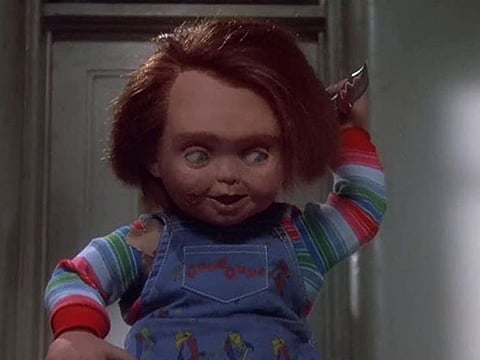 The emergency alert described Chucky as a 3-foot, 1-inch-tall (0.9-meter-tall) doll wearing "blue denim overalls with multi-colored striped long sleeve shirt wielding a huge kitchen knife.''