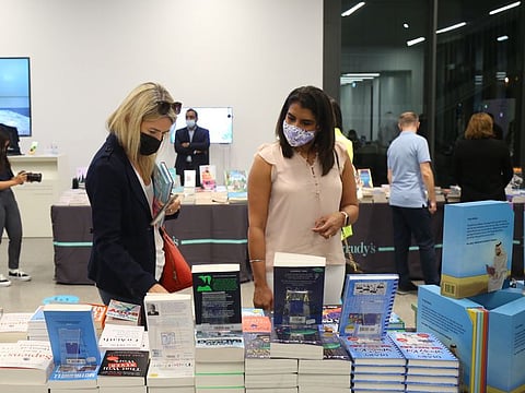  Visitors browse through the titles at Emirates Airline Festival of Literature.