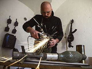 Changing the tune: Serbian artist turns weapons into instruments