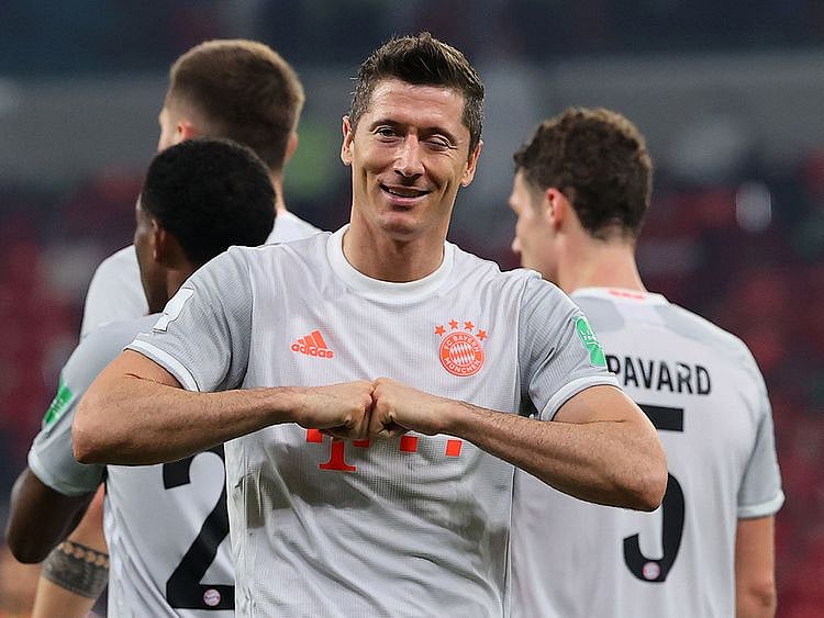 Bayern Munich's Polish forward Robert Lewandowski celebrates his second goal during the FIFA Club World Cup semi-final football match between Egypt's Al-Ahly and Germany's Bayern Munich at the Ahmed bin Ali Stadium in the Qatari city of Ar-Rayyan on February 8, 2021. (Photo by Karim JAAFAR / AFP)