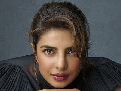This cover image released by Ballantine shows "Unfinished," a memoir by Priyanka Chopra Jonas.