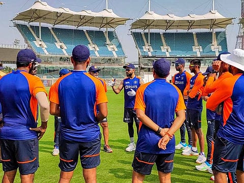 File photo: Indian cricket captain Virat Kohli with teammates during a training session at MA Chidambaram Stadium, in Chennai, Tuesday, Feb. 2, 2021.