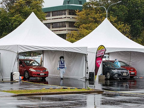 Motorists queue at the Otara testing station after a positive COVID-19 case was reported in the community as the city enters a level 3 lockdown in Auckland on February 15, 2021. 