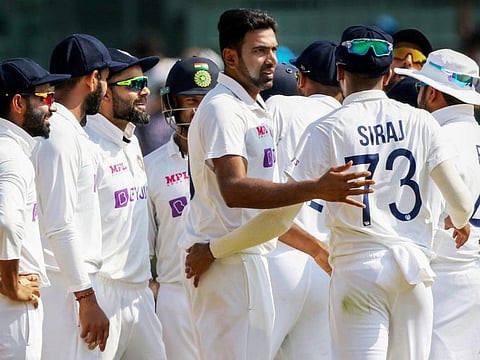 Ravichandran Ashwin (centre) celebrates with teammates the wicket of England's Dan Lawrence during the fourth day of the second Test against England at M.A. Chidambaram Stadium in Chennai on Tuesday. India won the match by 317 runs.