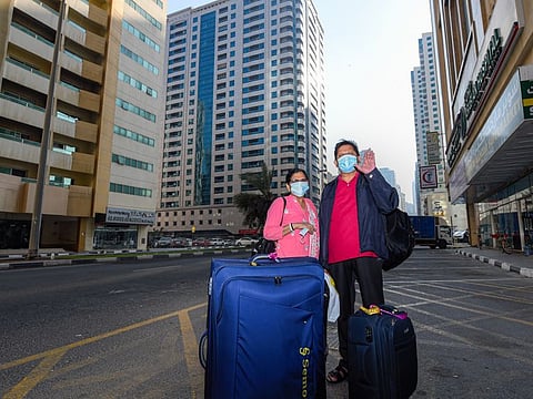 Mohandhas Aiyapillai and his wife Kamala leaving for Dubai airport as they finally go back home. 