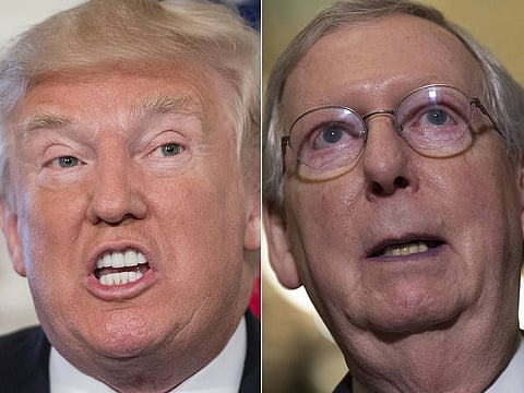 Donald Trump (L) and Mitch McConnell.
