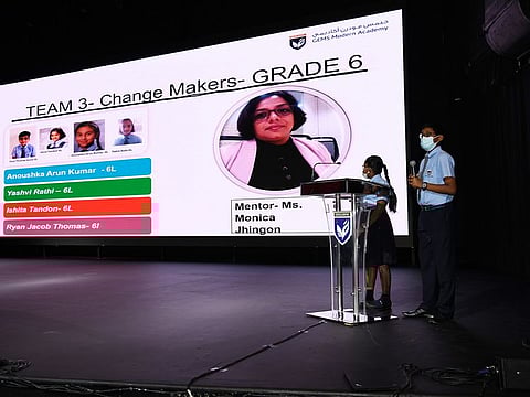 The winning ‘Change Makers’ team members make their presentation.